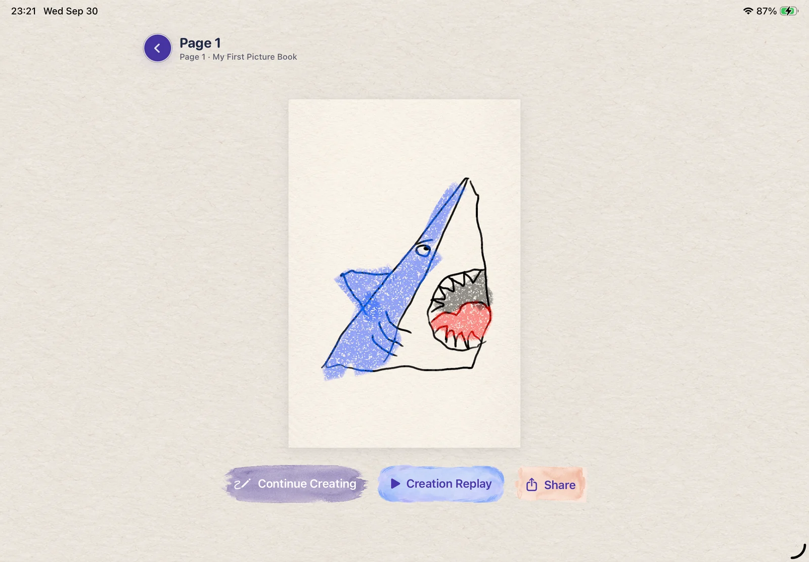 A hand-drawn blue shark with visible crayon texture in LittlePaper